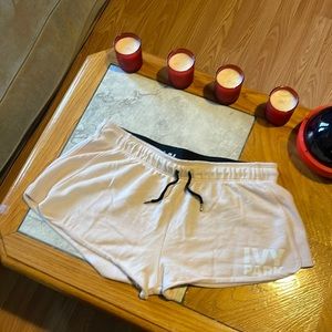 Woman’s wide band large Ivy park draw string shorts pink white and black